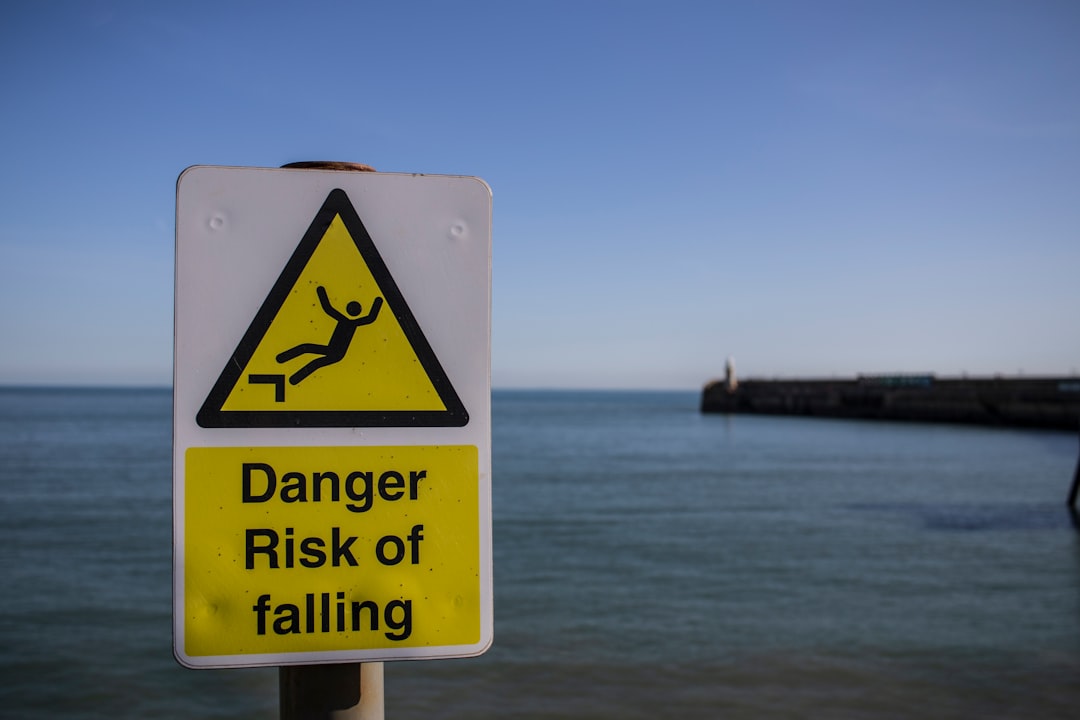a sign warning of a danger of falling